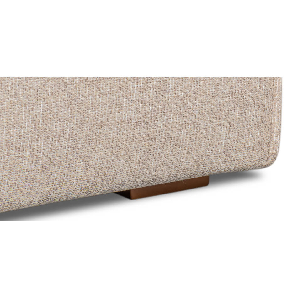 Close-up base detail of minimalist linen sofa.