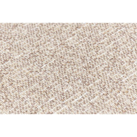 Fabric texture close-up of minimalist linen sofa.