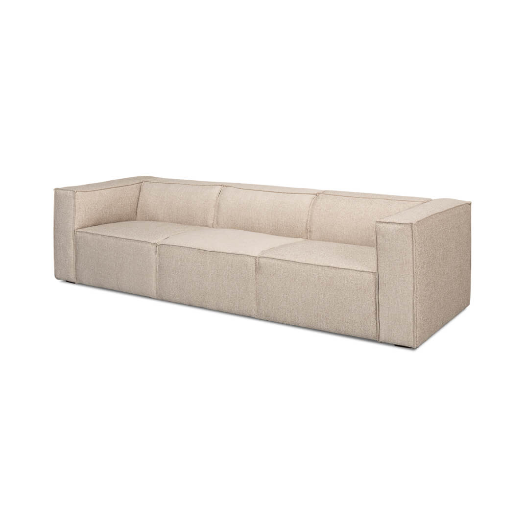 Beige minimalist linen sofa angled view.