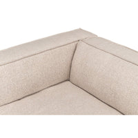 Close-up corner detail of minimalist linen sofa.
