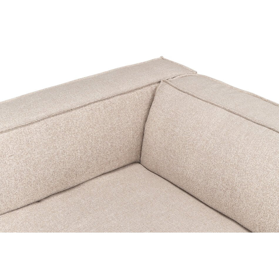 Close-up corner detail of minimalist linen sofa.