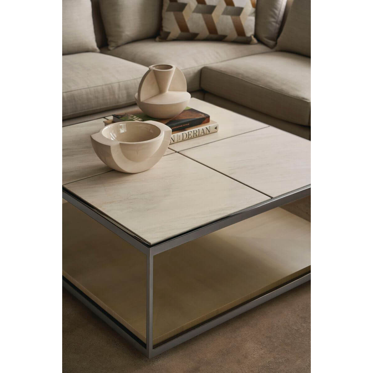 Minimalist coffee table close-up with decorative ceramic bowls.