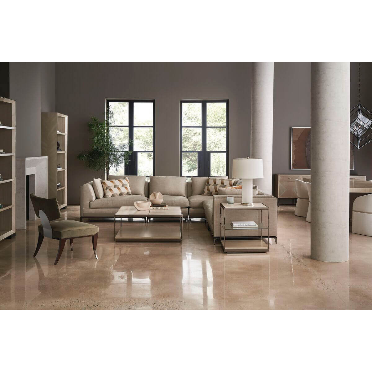 Elegant living room featuring minimalist coffee tables and seating.