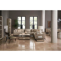 Elegant living room featuring minimalist coffee tables and seating.