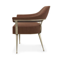 Modern barrel back armchair, side profile, curved back.