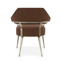 Modern barrel back armchair, rear angle, elegant structure.