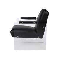 Side profile of black and lucite accent chair