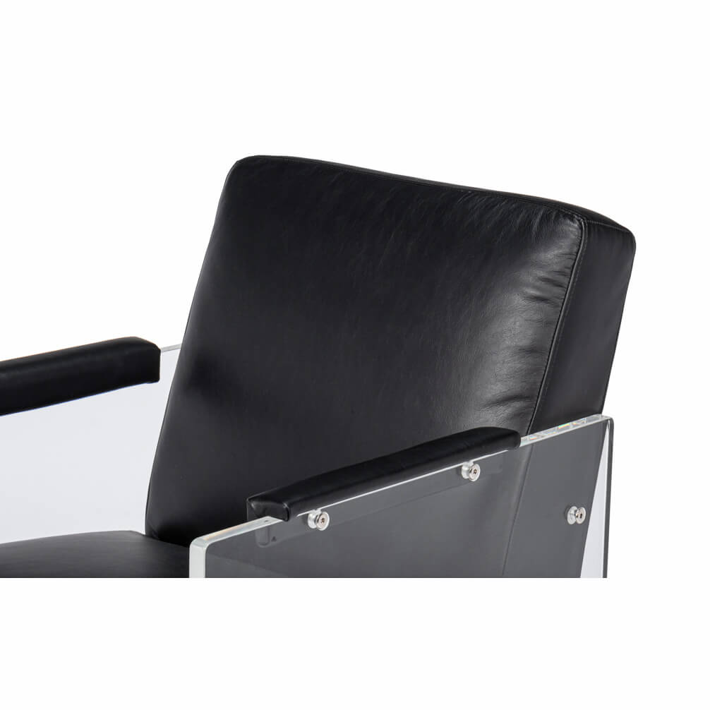 Upper section view of black leather accent chair