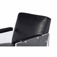 Upper section view of black leather accent chair