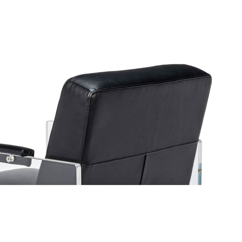 Close-up of backrest on black leather chair