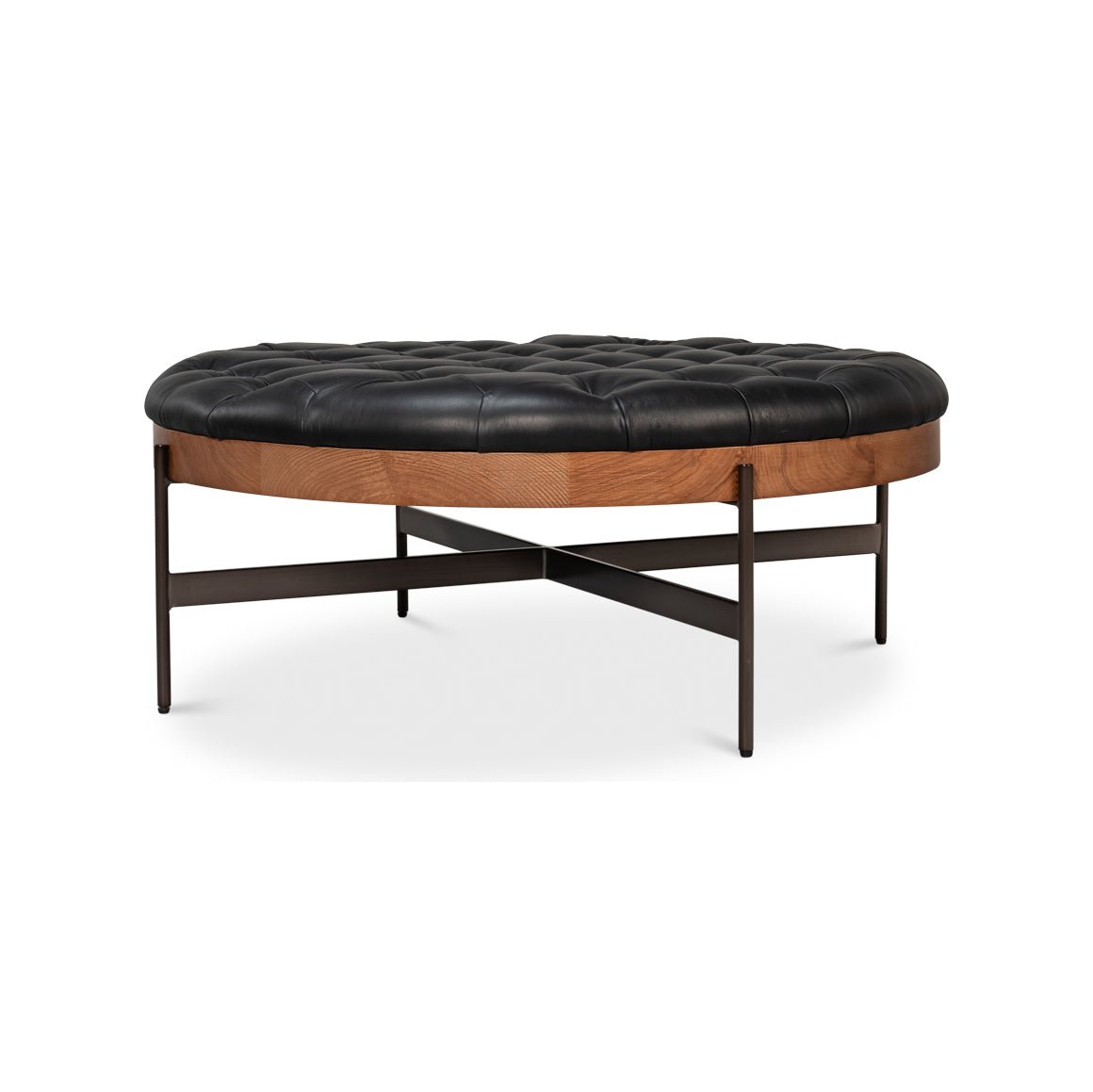 Angled view of leather cocktail ottoman with wooden base.