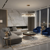 Modern living room with black leather cocktail ottoman.