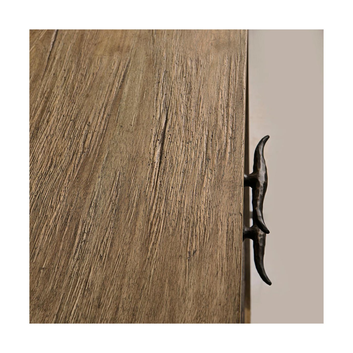 Wood grain and handle detail on sideboard.