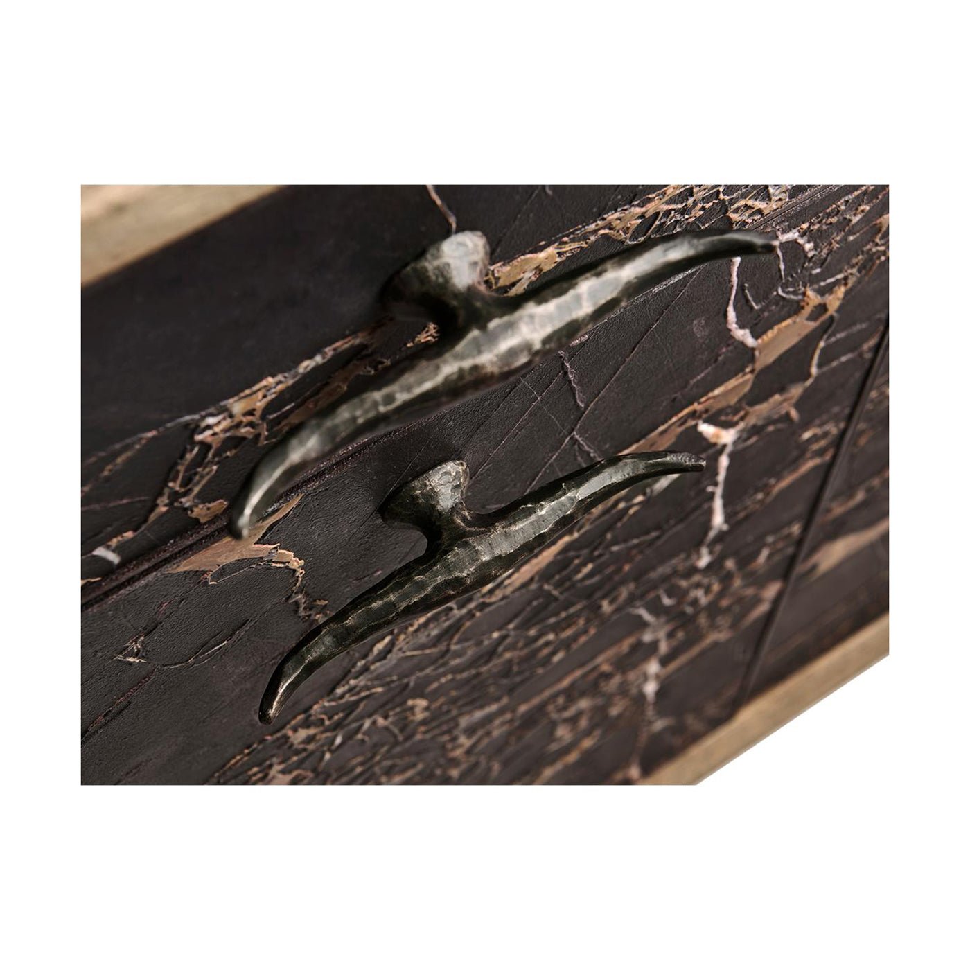 Close-up of unique sideboard handles.