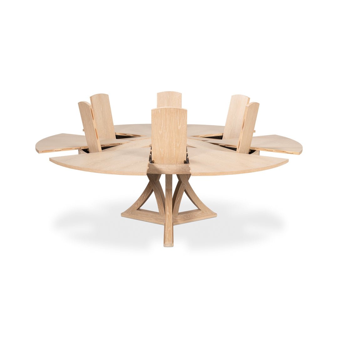 Dining table showing leaf extension mechanism while opening.