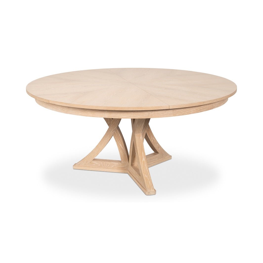 Oak dining table at mid-extension, front side view.