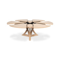 Half extended bleached oak jupe dining table top view.