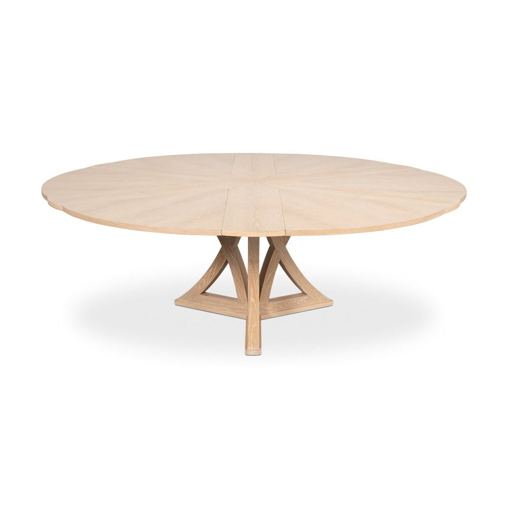 Fully extended bleached oak jupe dining table front view.