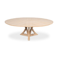 Fully extended bleached oak jupe dining table front view.