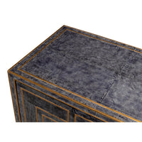 Close-up of cabinet top surface, blue leather texture.