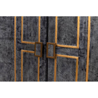 Close-up of cabinet doors, leather texture and handles.