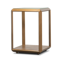 Angled side view modern brass finish accent table.