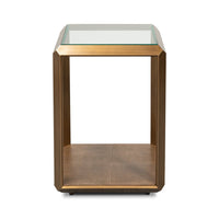 Front view of modern brass finish accent table.