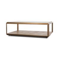 Angled view of coffee table, wooden lower shelf.