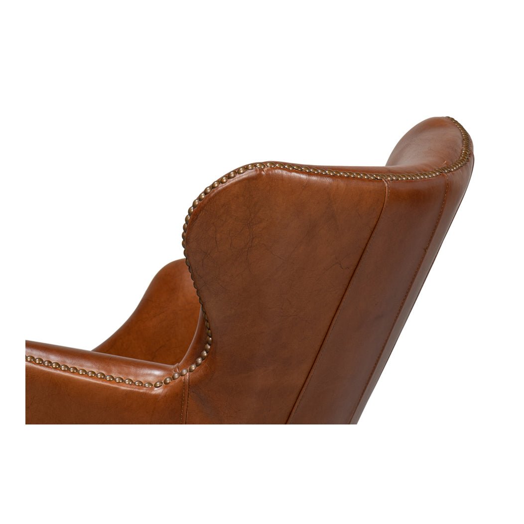 Brown leather desk chair upper back detail