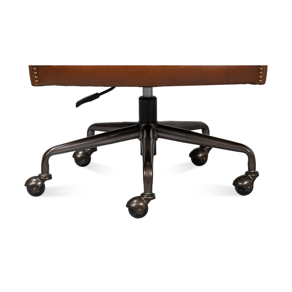 Brown leather desk chair caster base detail
