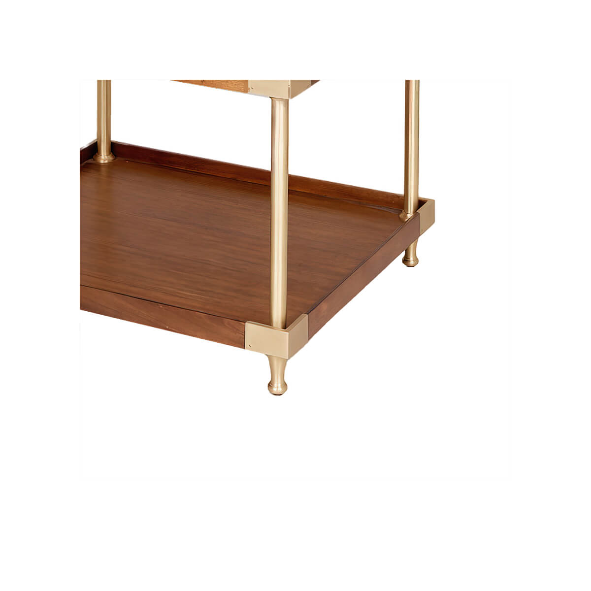 Bottom shelf and brass legs of etagere side table.