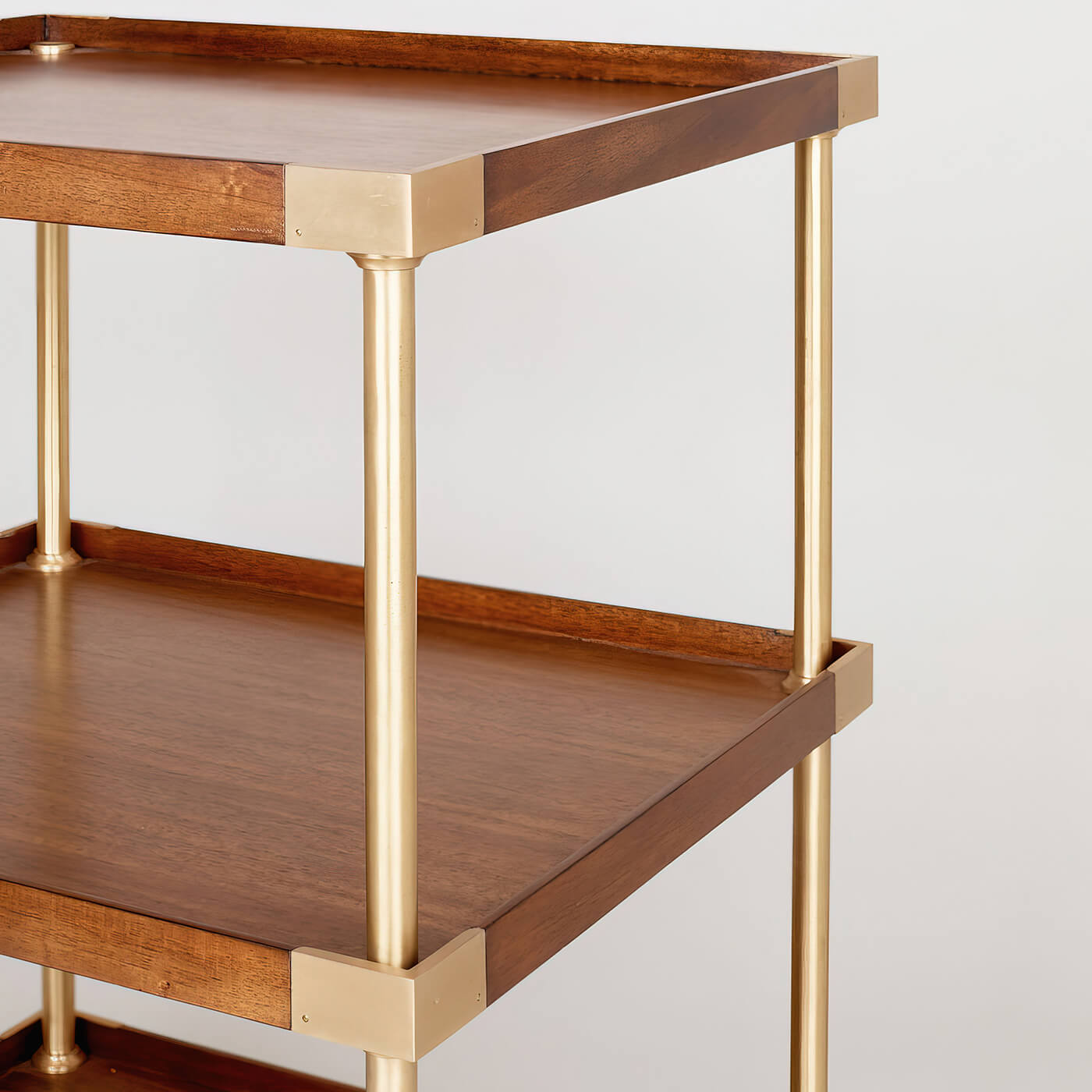 Close-up of etagere side table's shelf details.