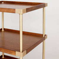 Close-up of etagere side table's shelf details.