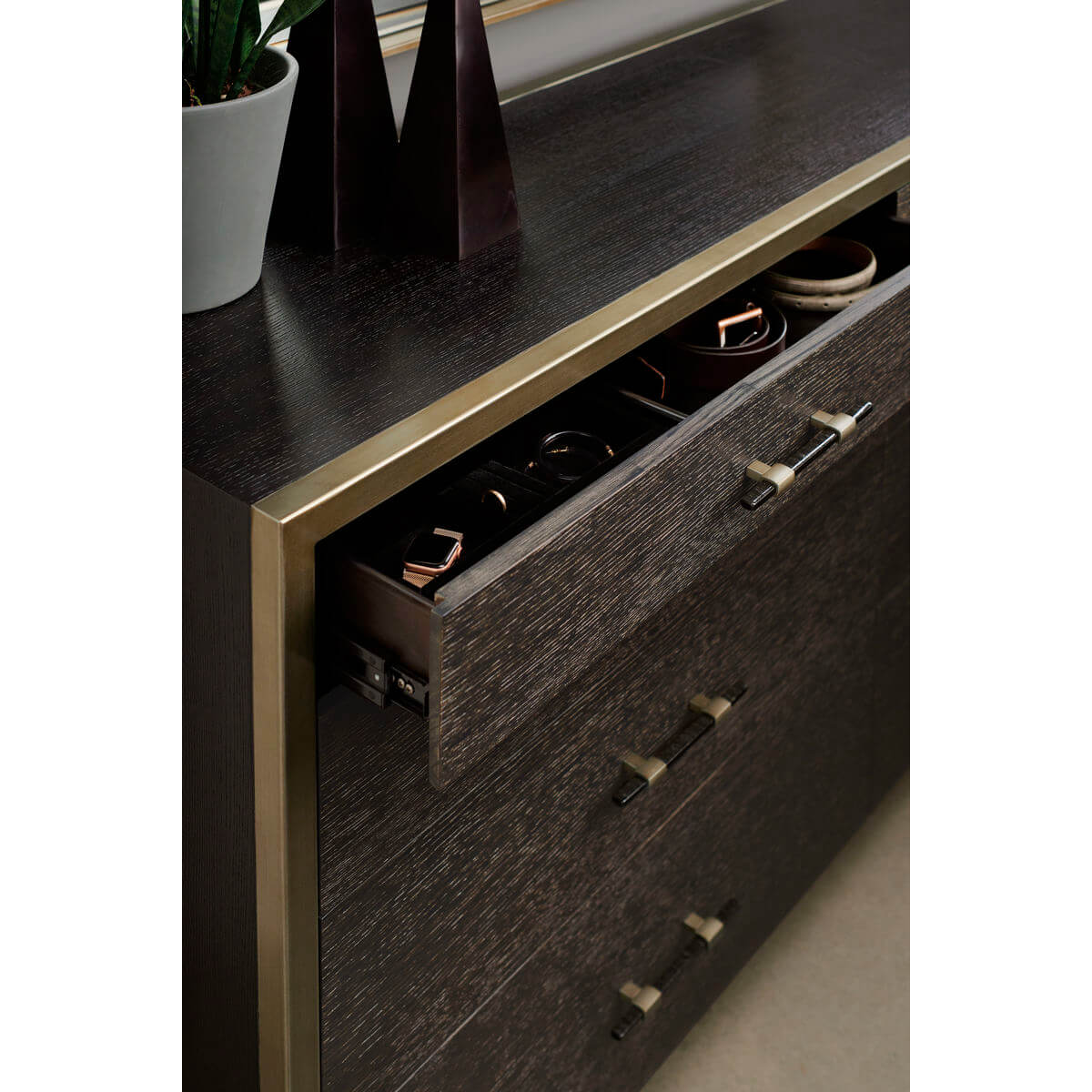 Close-up of open drawer with accessories inside.