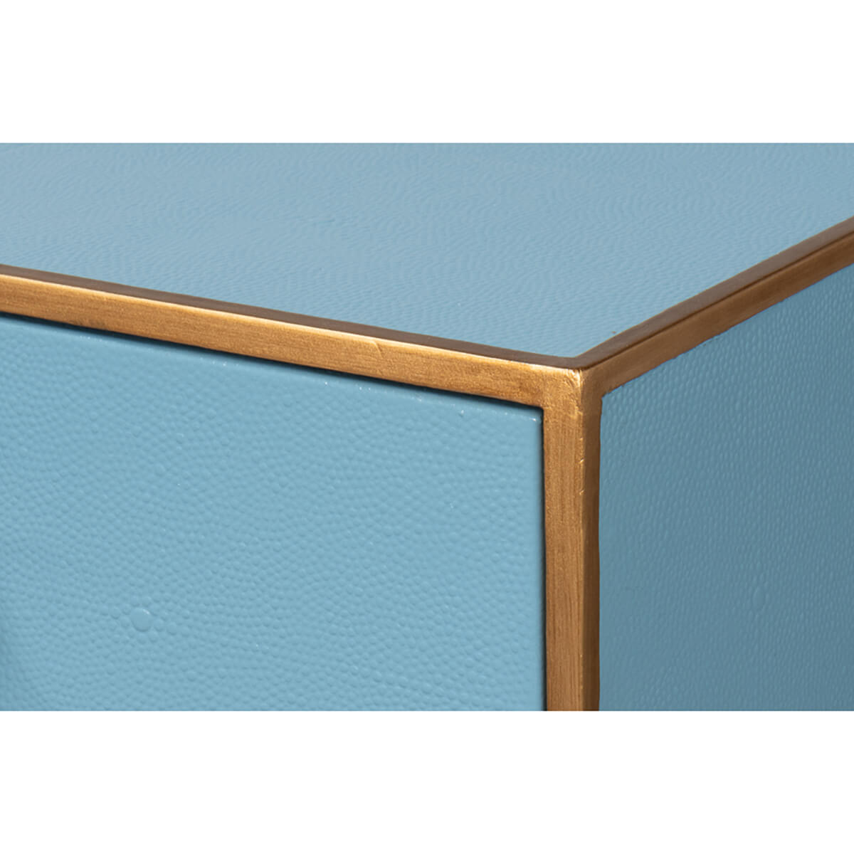 Close-up corner detail, blue leather console table.