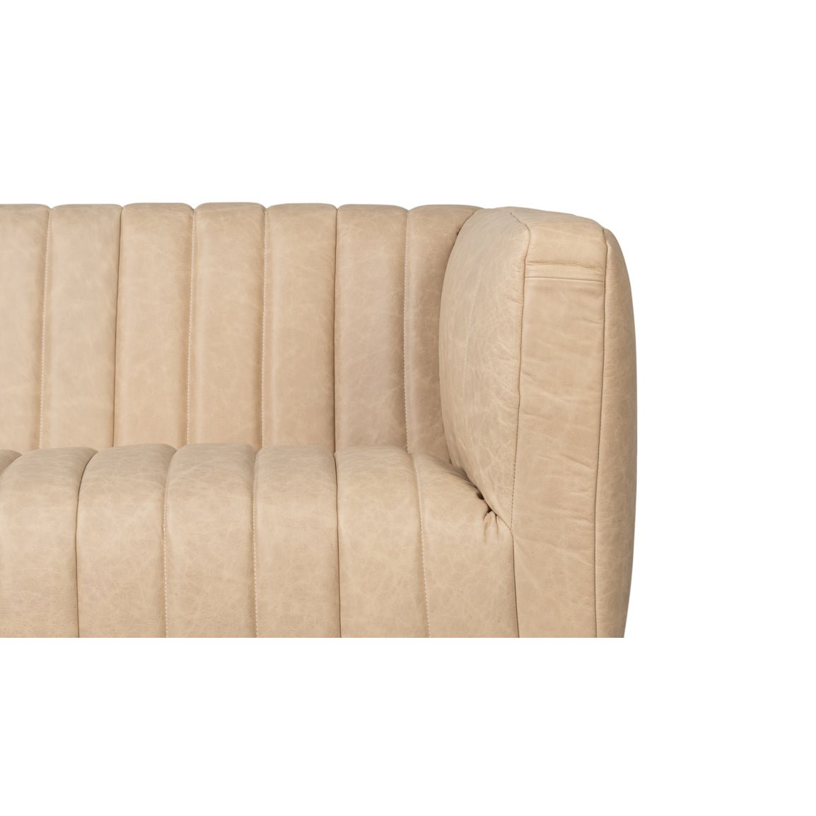 Back and side detail of modern tufted leather sofa.