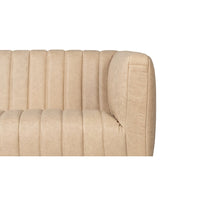 Back and side detail of modern tufted leather sofa.