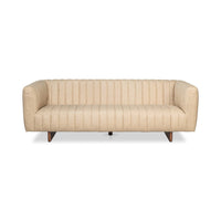 Front view of modern tufted leather sofa, vertical lines.