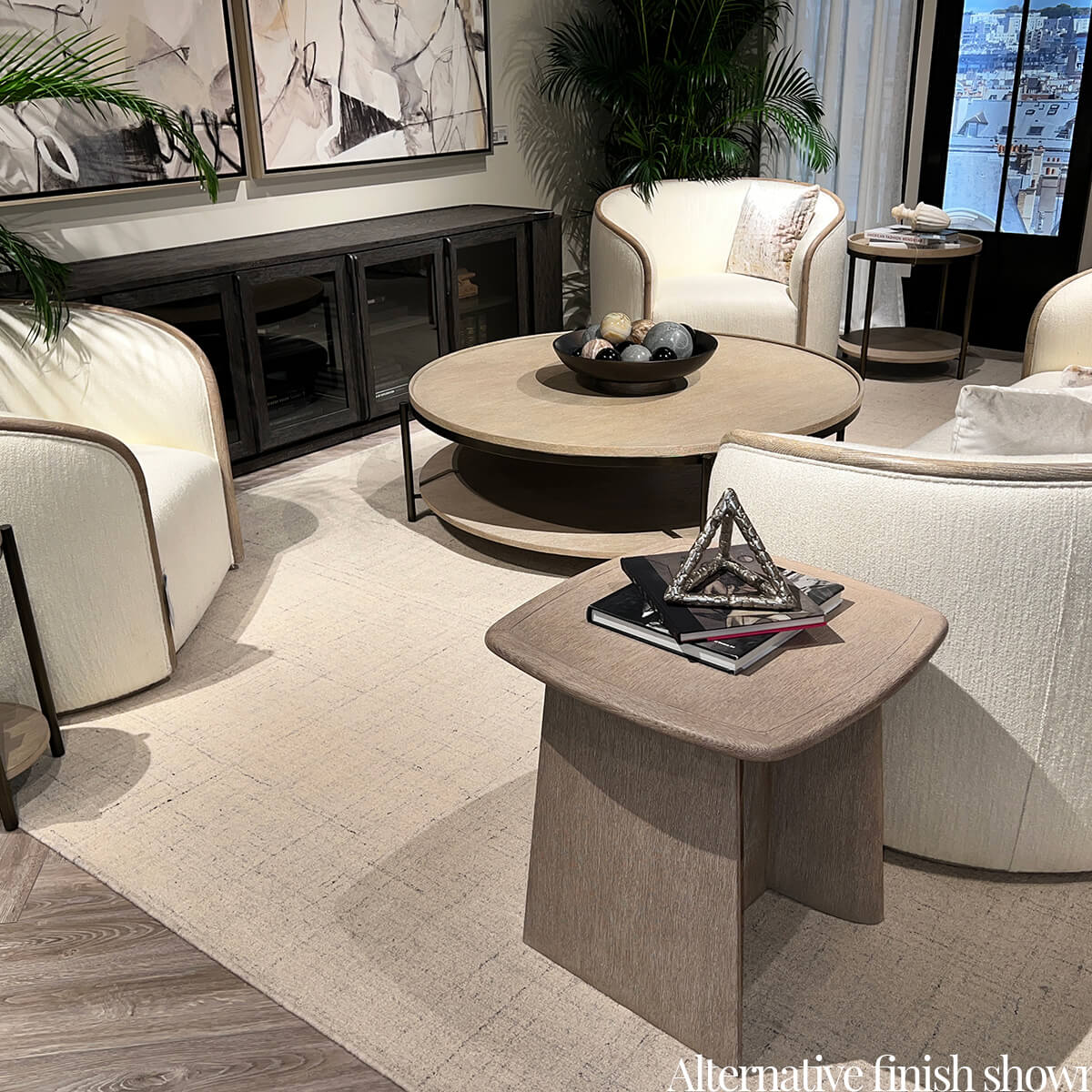 Living room with modern charcoal oak round coffee table.