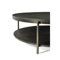 Modern charcoal oak round coffee table leg design detail.