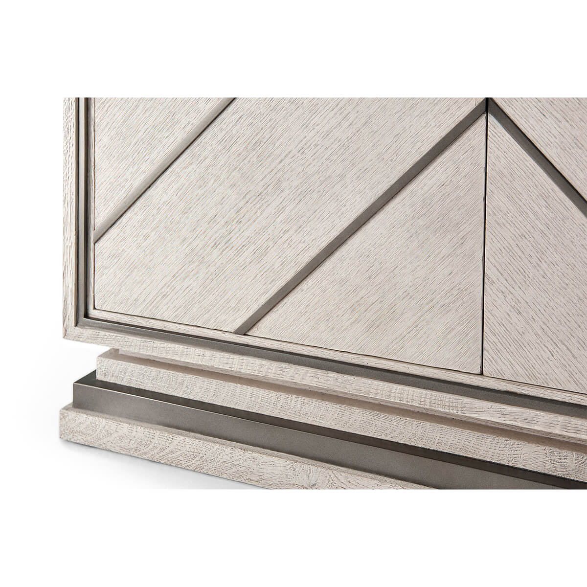 Modern chevron cabinet close-up base detail.
