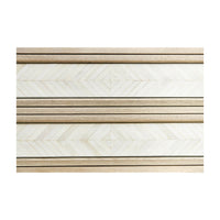 Detailed view of chevron parquetry drawer fronts.