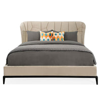 Front view of modern king bed with colorful cushions.