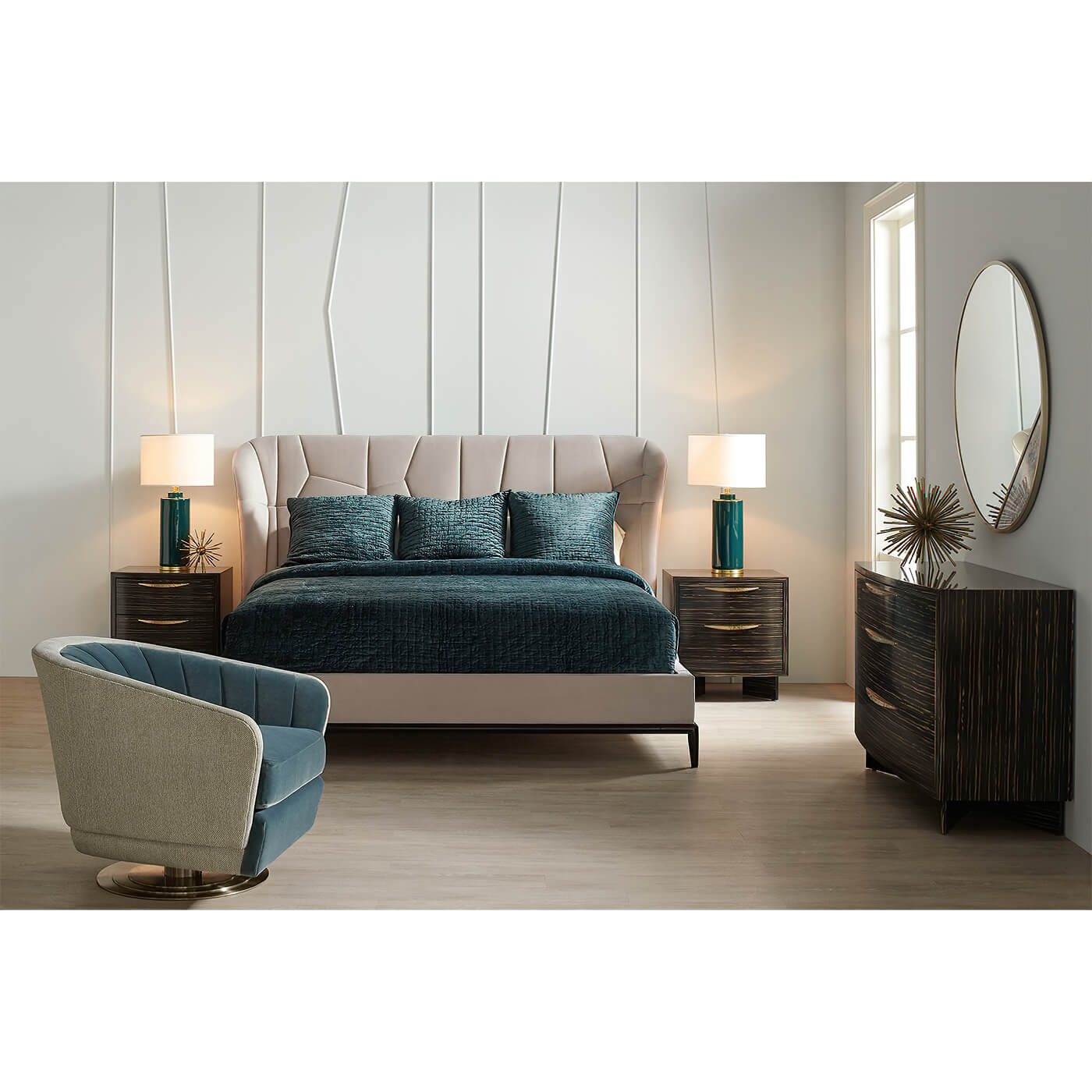 Bedroom setup with modern bed, chairs, and furniture.