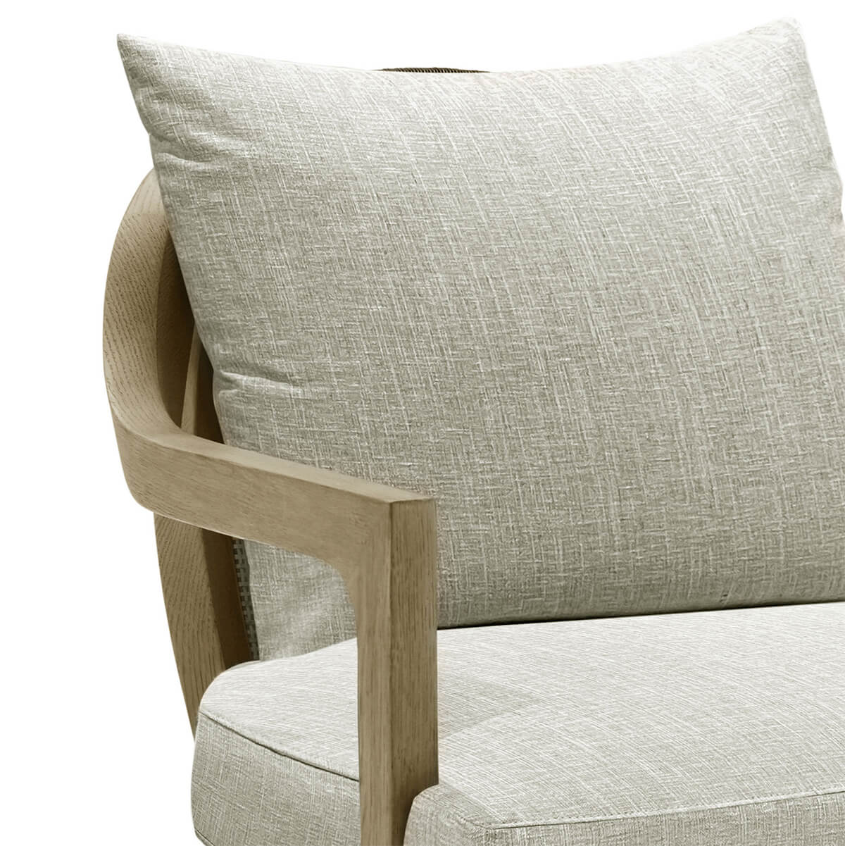 Close-up of cushion and armrest on armchair.