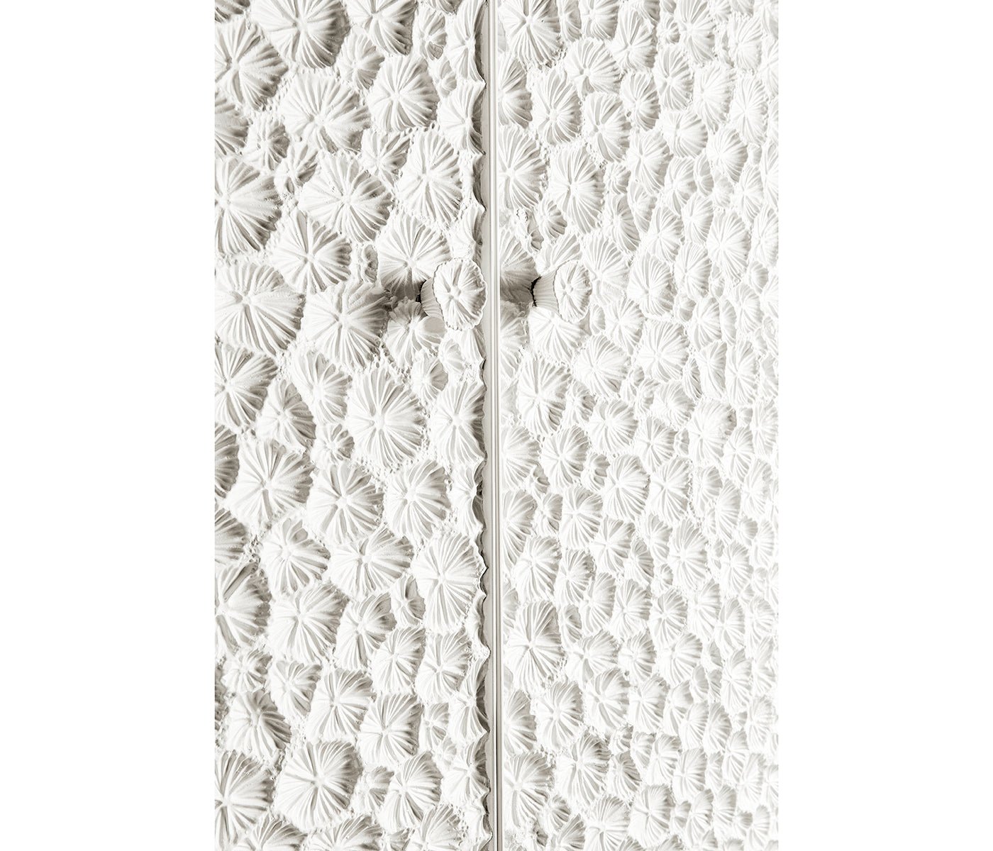 Close-up of modern cabinet door texture detail.