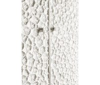 Close-up of modern cabinet door texture detail.