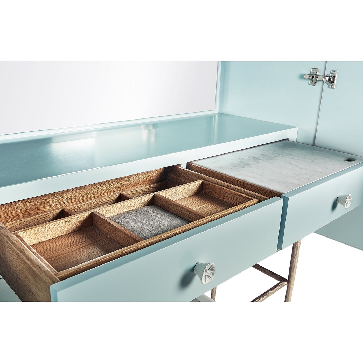Open drawers inside bar cabinet showing organizers.