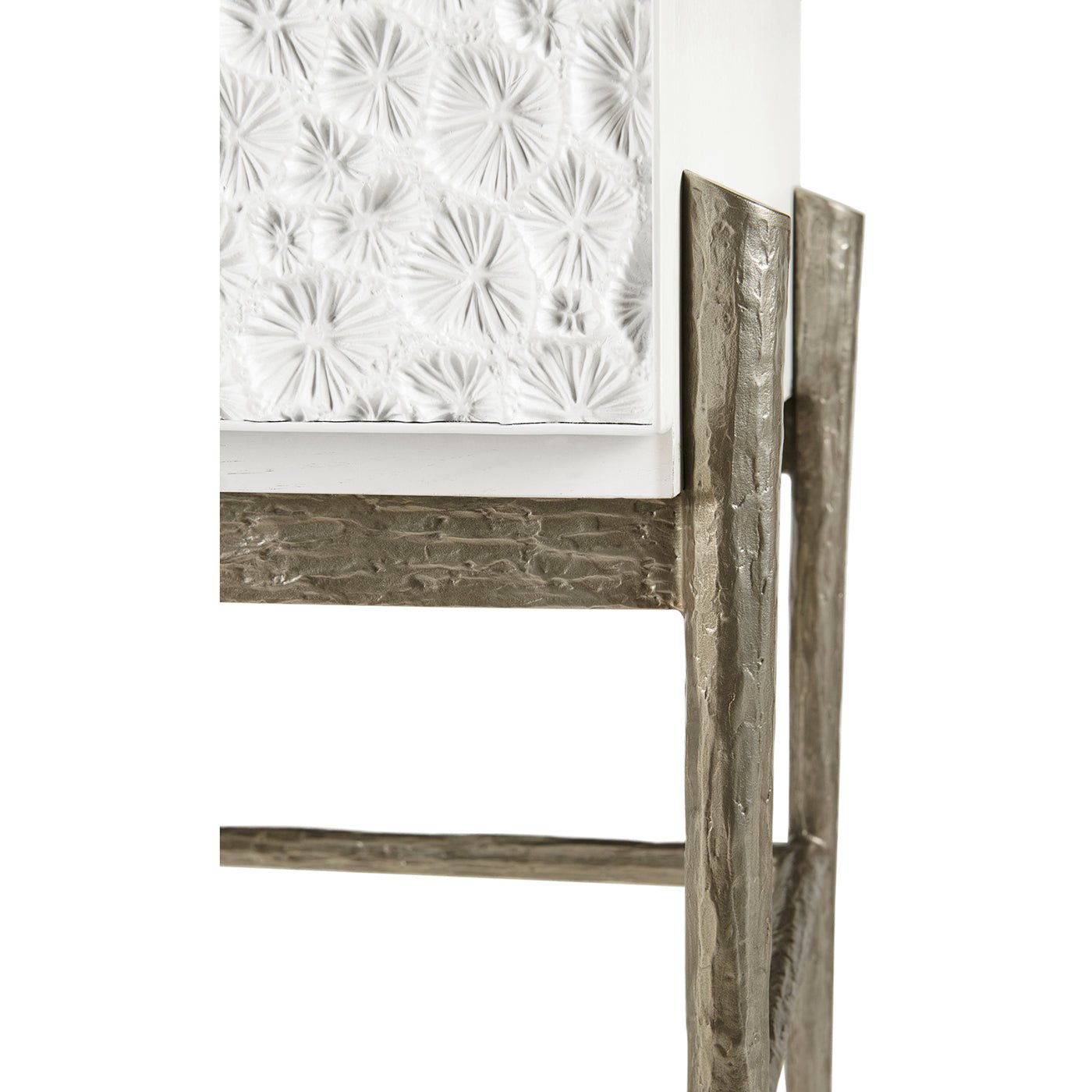 Textured cabinet detail with metal frame close-up.