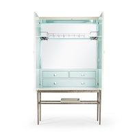Interior of bar cabinet, drawers and glass rack.